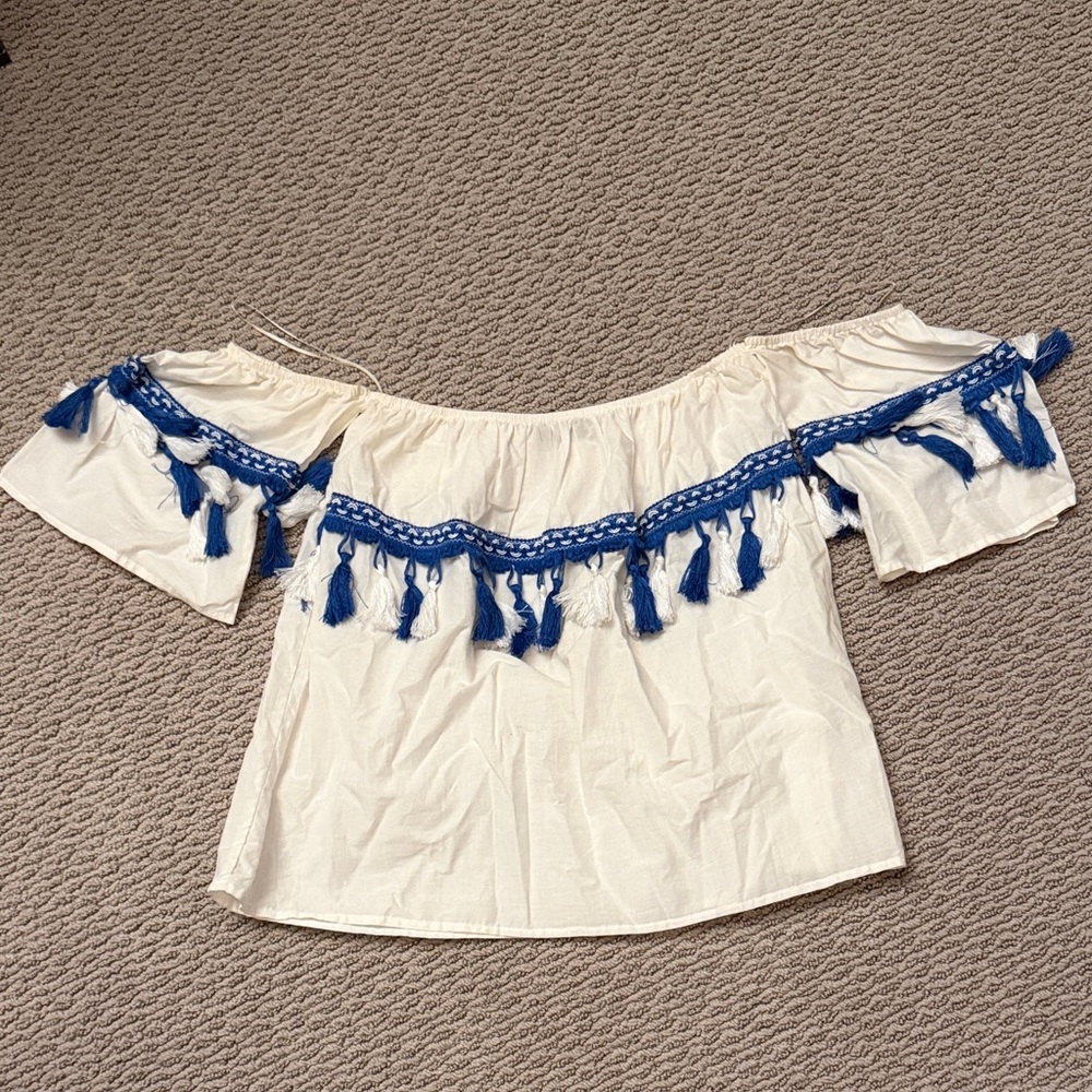 Blue Rain Cream Off-Shoulder Blouse with Blue Tassels